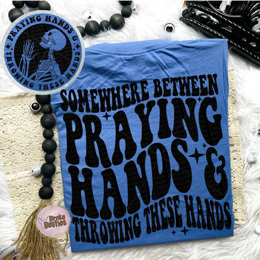 Somewhere Between Praying Hands & Throwing These Hands
